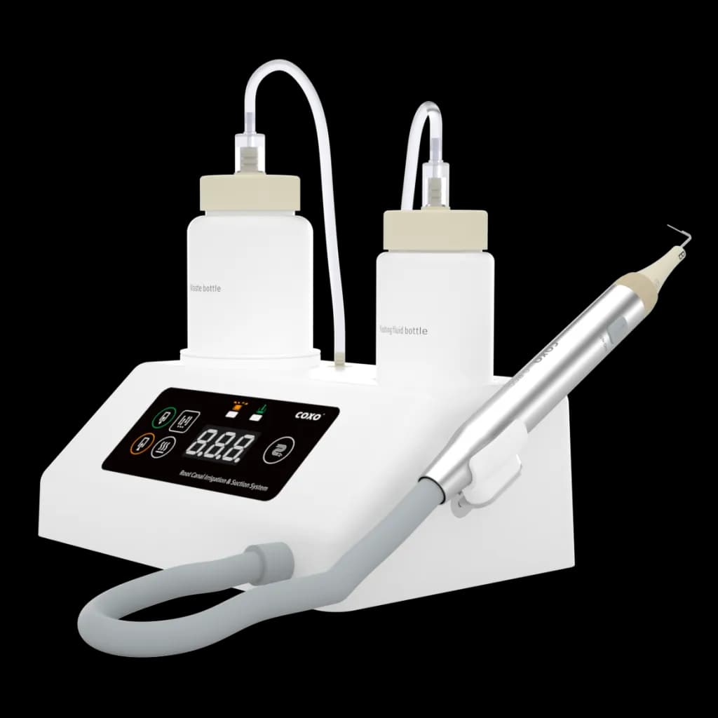 COXO C-RCC — Hệ Thống Bơm Rửa-Hút Kênh Tủy